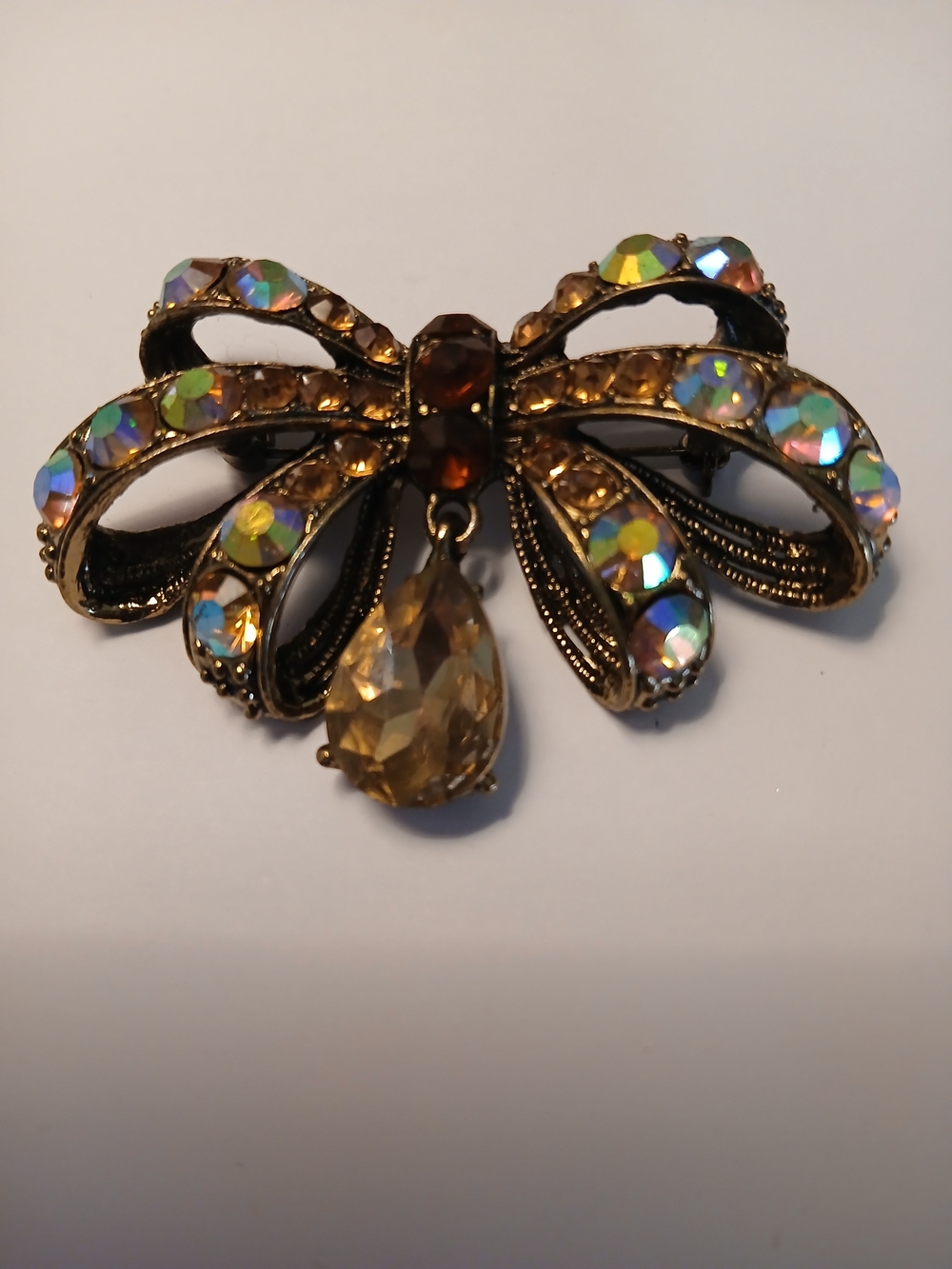 Gold Bow Brooch with Iridescent and Amber Stones - Signed